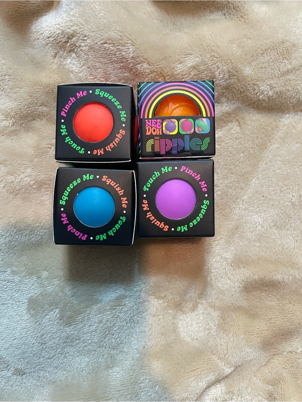 4 Mini Nee Doh Sensory Squeeze Balls - Red, Blue, Purple, Orange